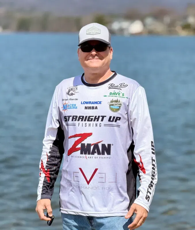 Brian in tournament jersey with sponsor logos including BardeRodz, Z-Man, Straight Up Fishing, and Kindlewood Outdoors